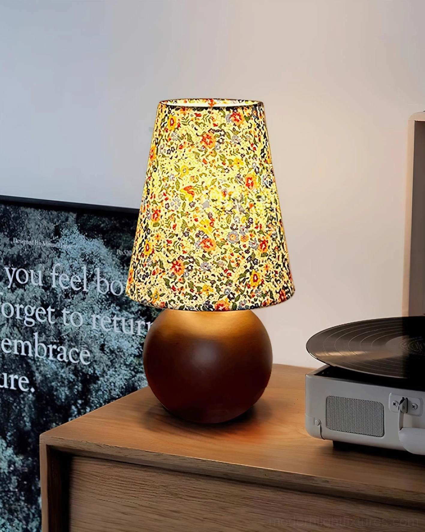Floral table lamp in farmhouse cottage interior design setting with vintage accessories
