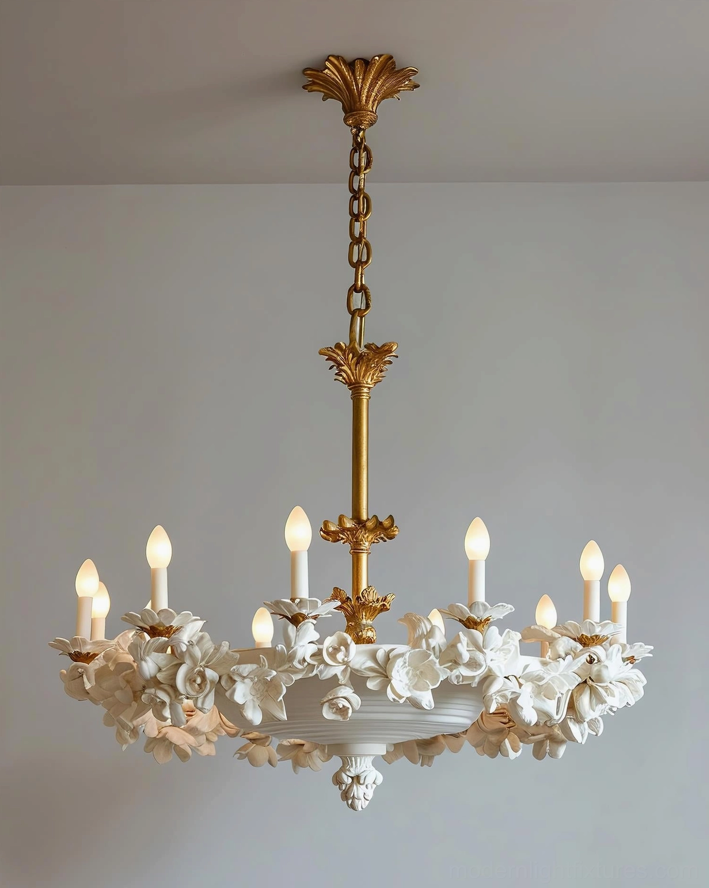 Florentine Petals chandelier showcasing aged brass patina and white floral elements
