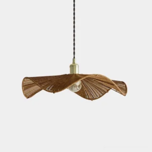Floressa hand-woven rattan pendant light with natural brown shade and brass base, front studio view