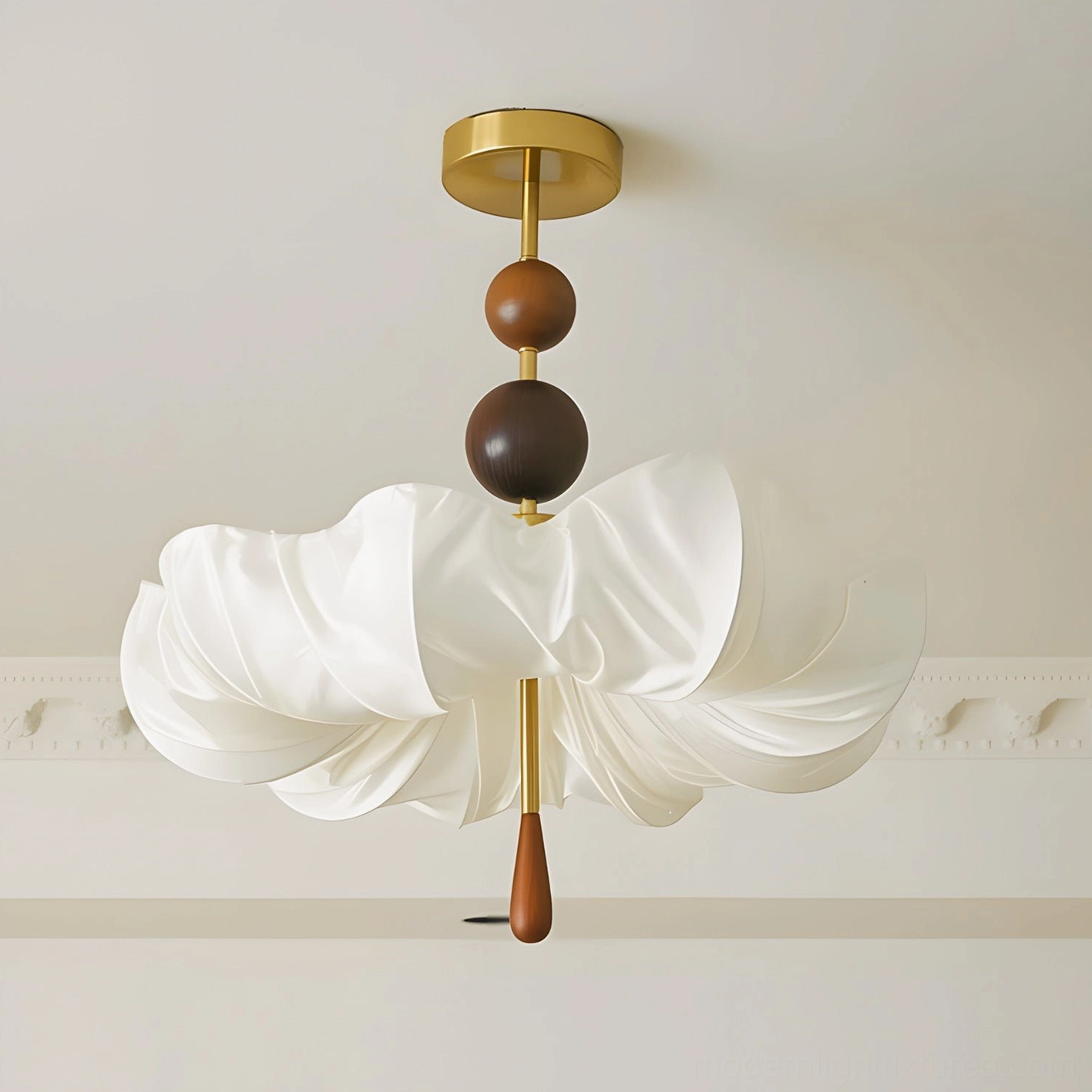 Floretta ceiling lamp with ruffled petal shade, brass hardware, and gradient wooden sphere accents installed in interior