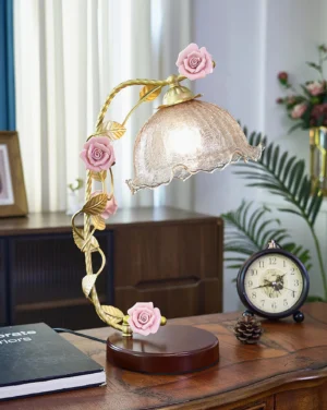 Florielle decorative table lamp displayed on vintage home side table with clock and books, brass metal frame detail