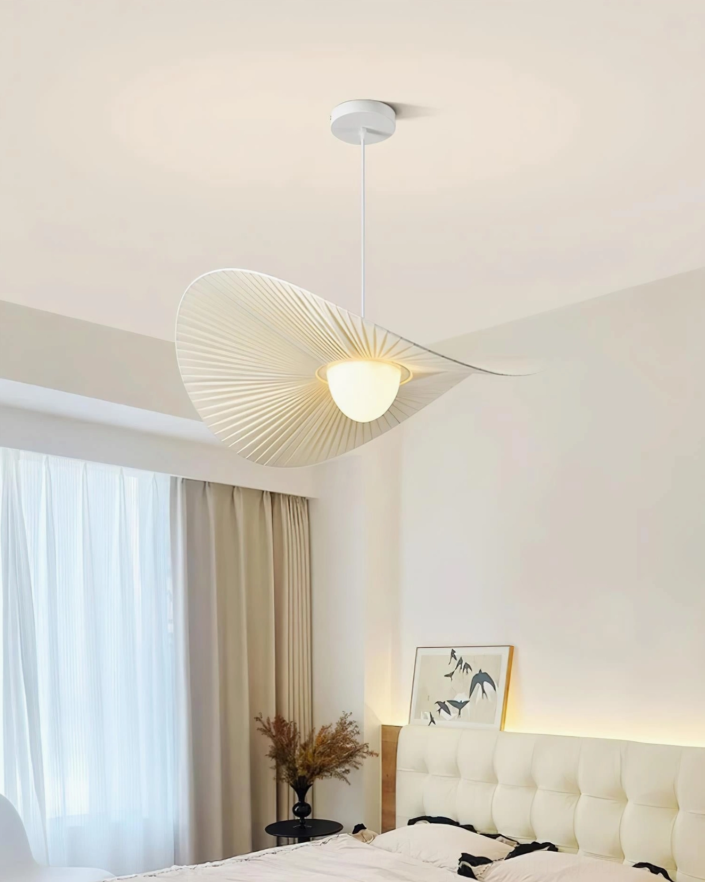 Florina pendant light installed in contemporary living room as sculptural focal point with warm white 3000K soft ambient glow