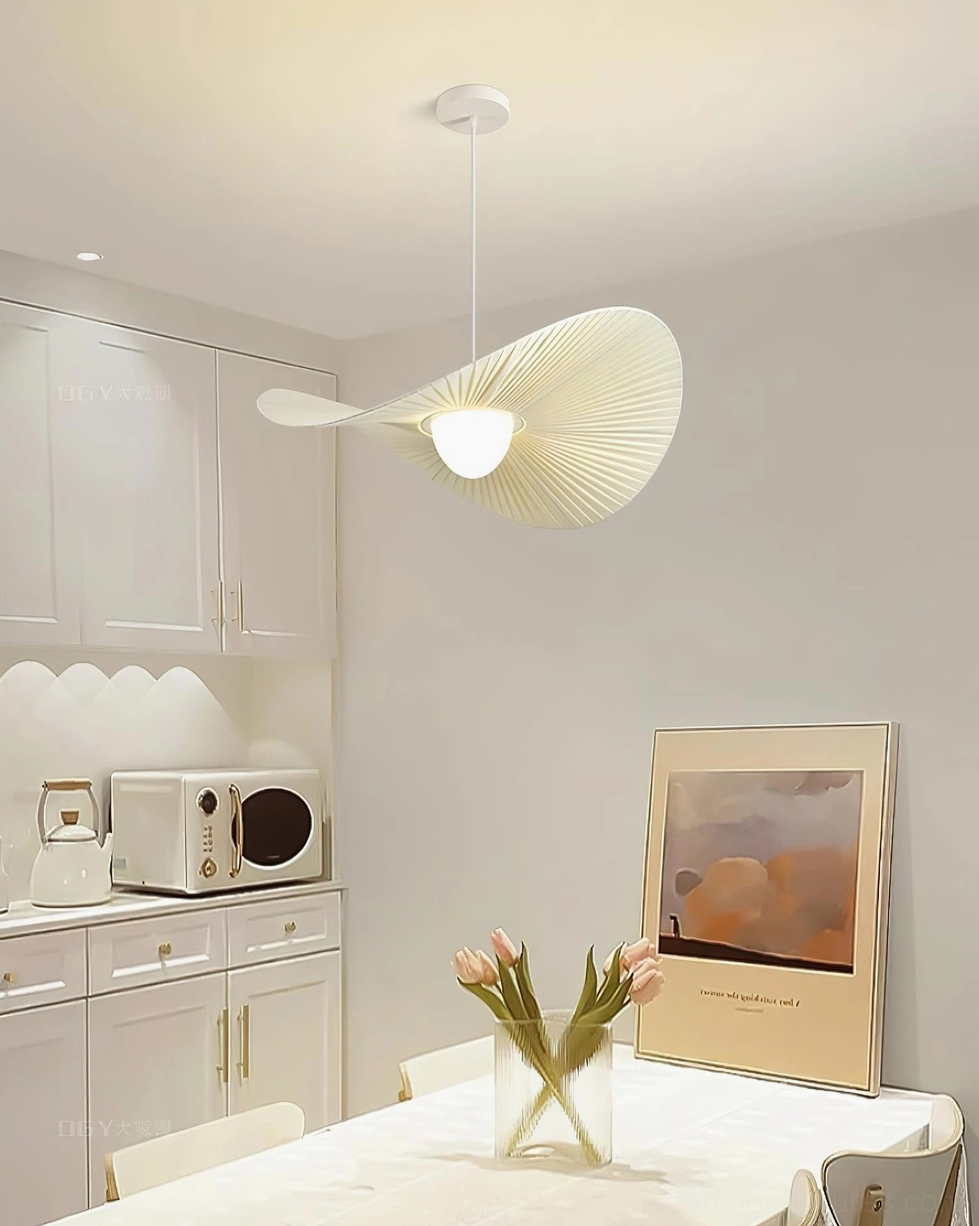 Florina pendant light overhead view in dining kitchen hybrid interior with decorative home setup artwork and flowers creating elegant ambiance