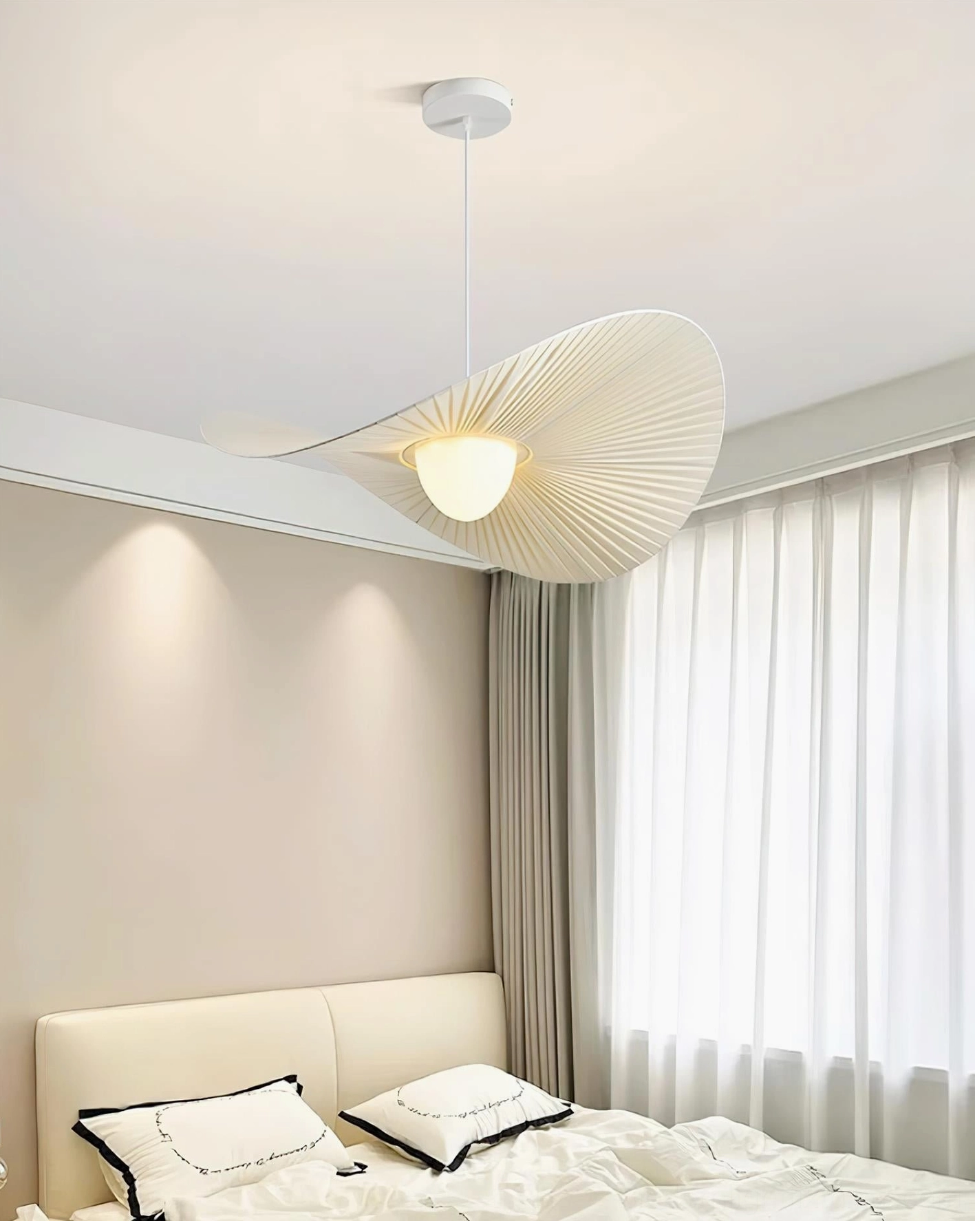 Florina ceiling light installed in minimalist bedroom with sheer window curtains creating soft warm wall illumination ambiance