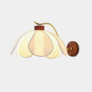 Florvia petal wall sconce with cream fabric shade and brass stem, front studio view showing vintage floral wall lamp design