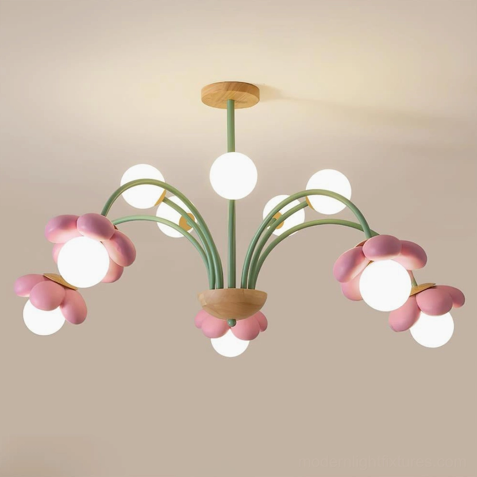 Modern flower ceiling light fixture with pink blooms and white globe bulbs, direct overhead angle with warm beige wall