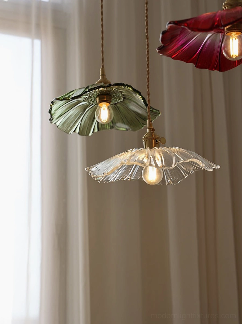 Flower glass pendant light with pink shade and decorative petal formation detail