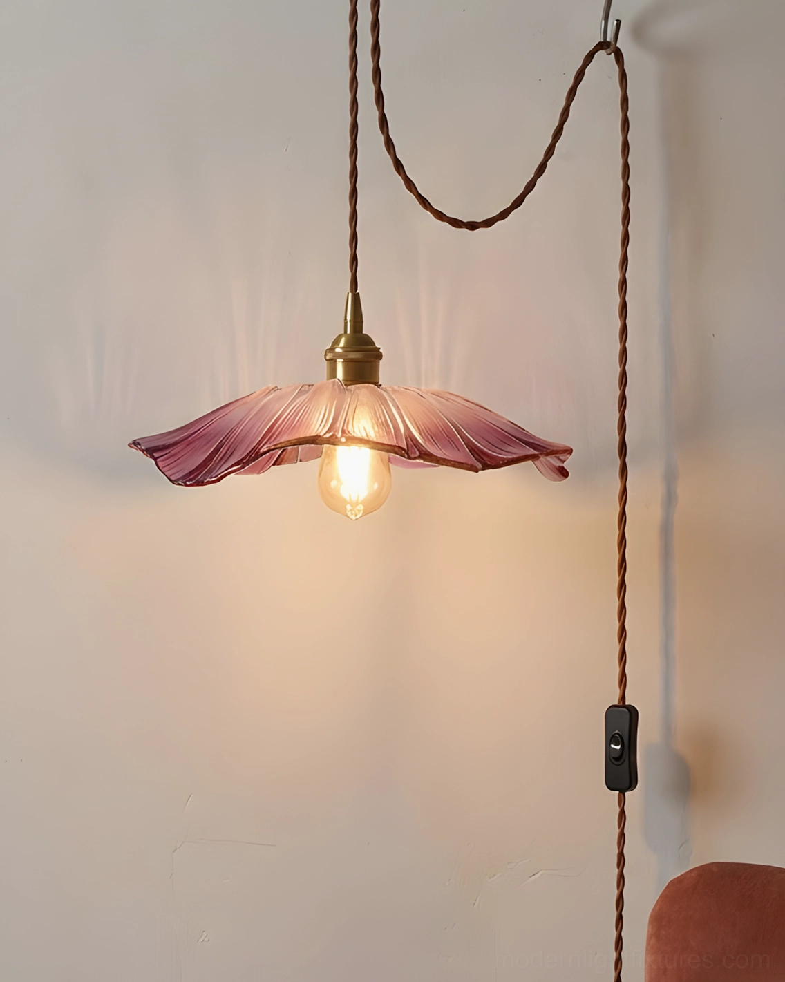 Adjustable plug-in pendant lamp with pink flower glass shade and brass wall bracket installation