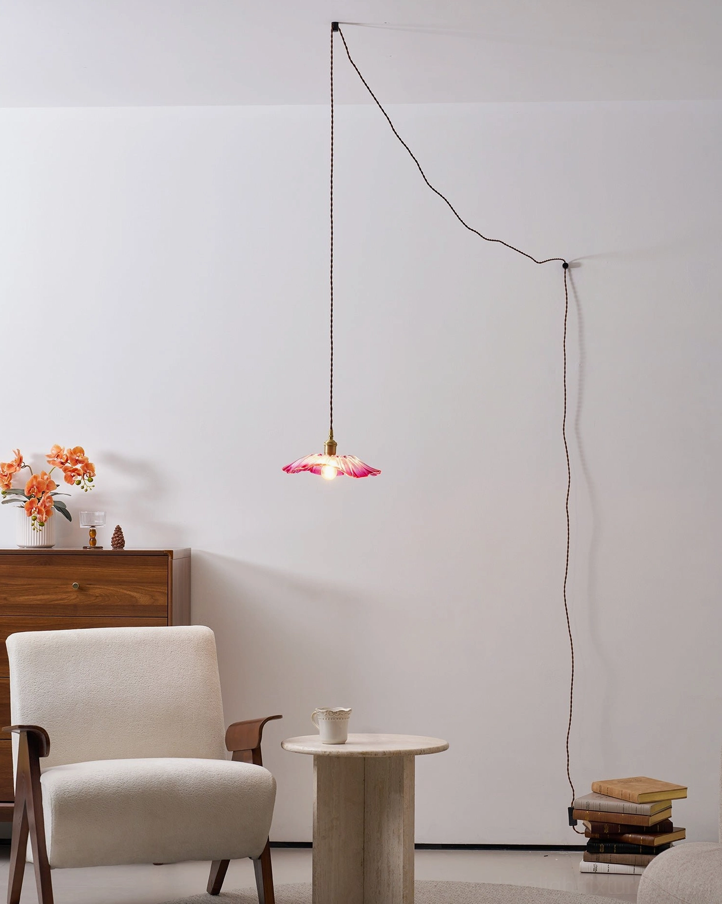 Pendant light with flower petal glass design in mid-century modern interior