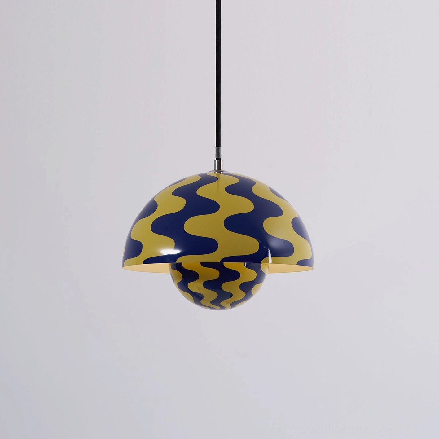 Flowerpot pendant light creating ambient lighting in sophisticated modern dining space