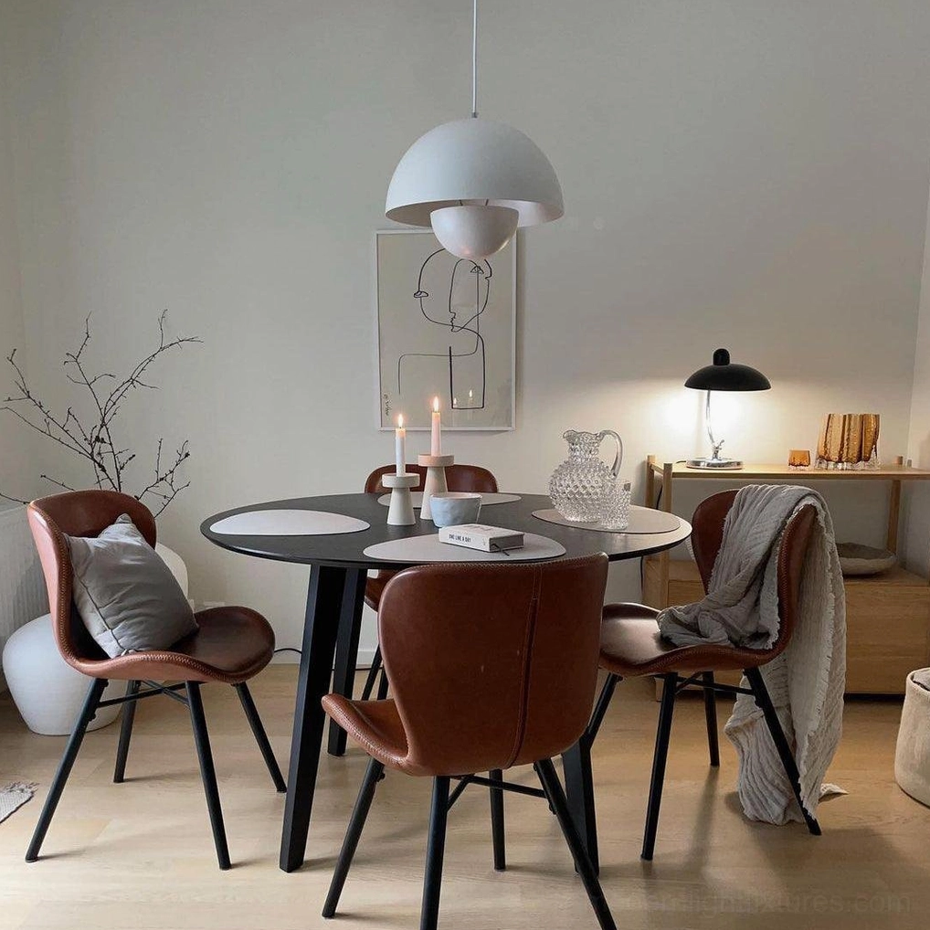 Flowerpot pendant light in blue finish reflecting light in modern contemporary space