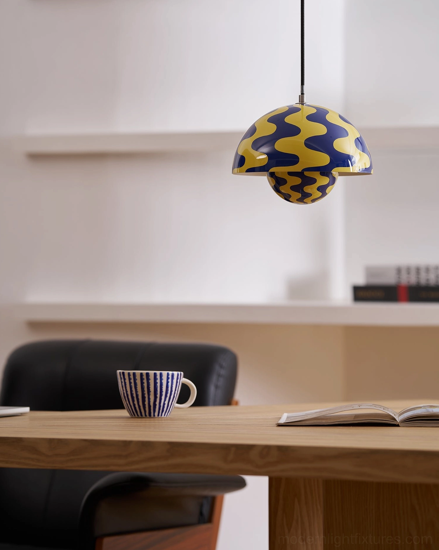 Flowerpot pendant light suspended in bright natural light contemporary interior space