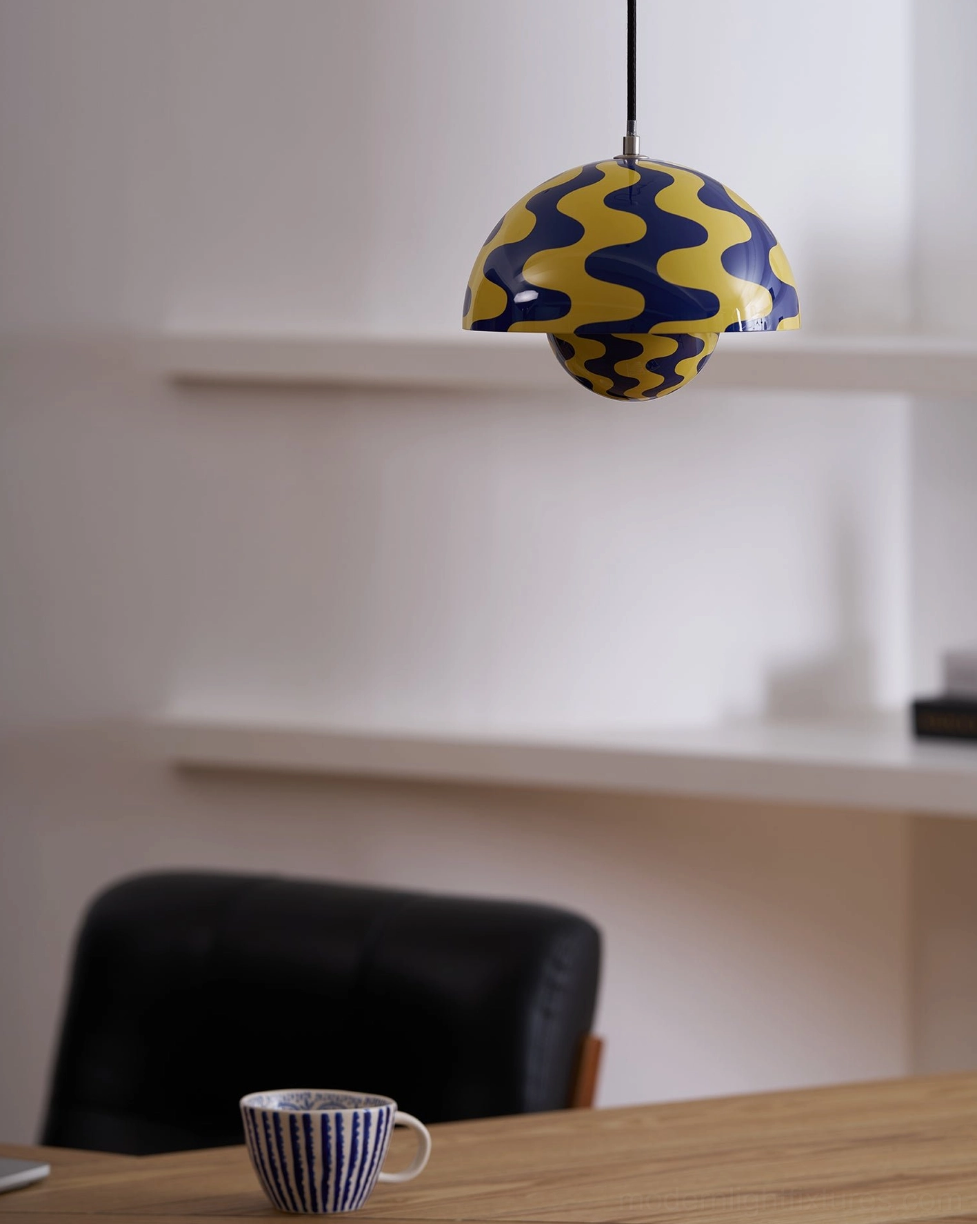 Flowerpot pendant light color accent against neutral wall and furnishings backdrop