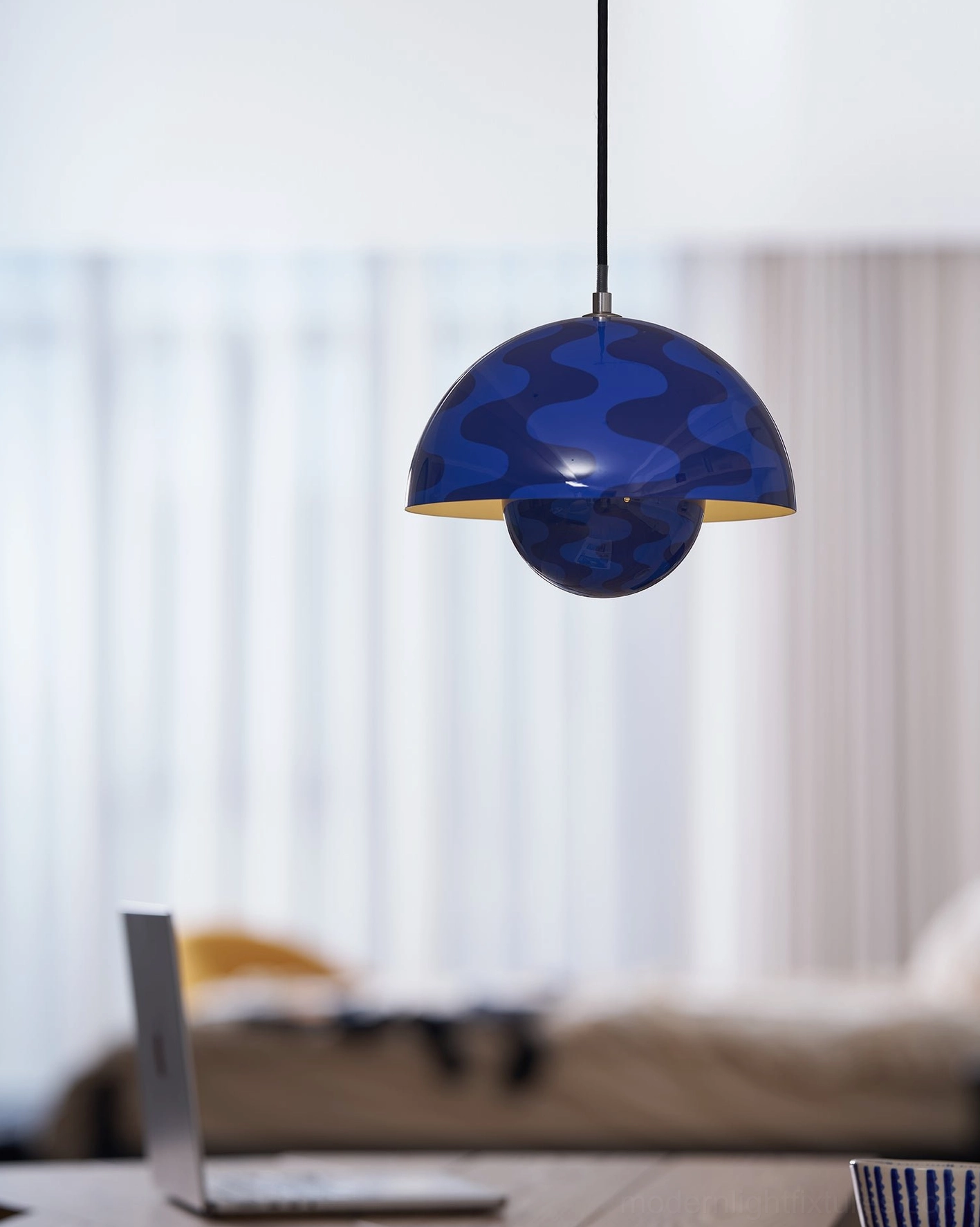 Flowerpot pendant light in finished interior room setting showing complete context