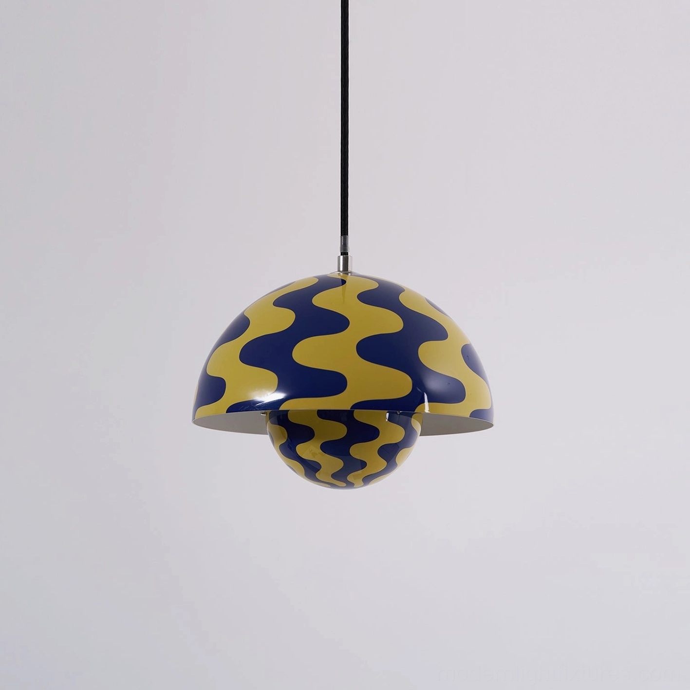 Flowerpot pendant light suspended above elegant dining table in bright spacious interior