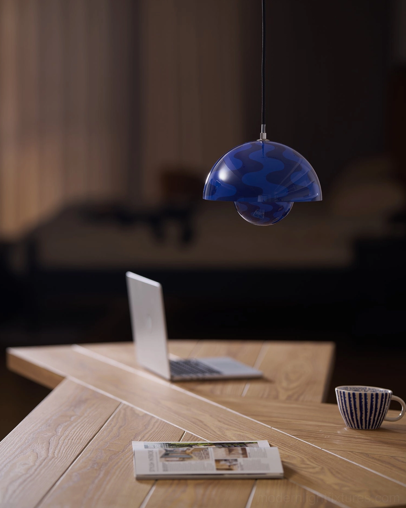 Flowerpot pendant light suspended at varied height showing flexible installation options