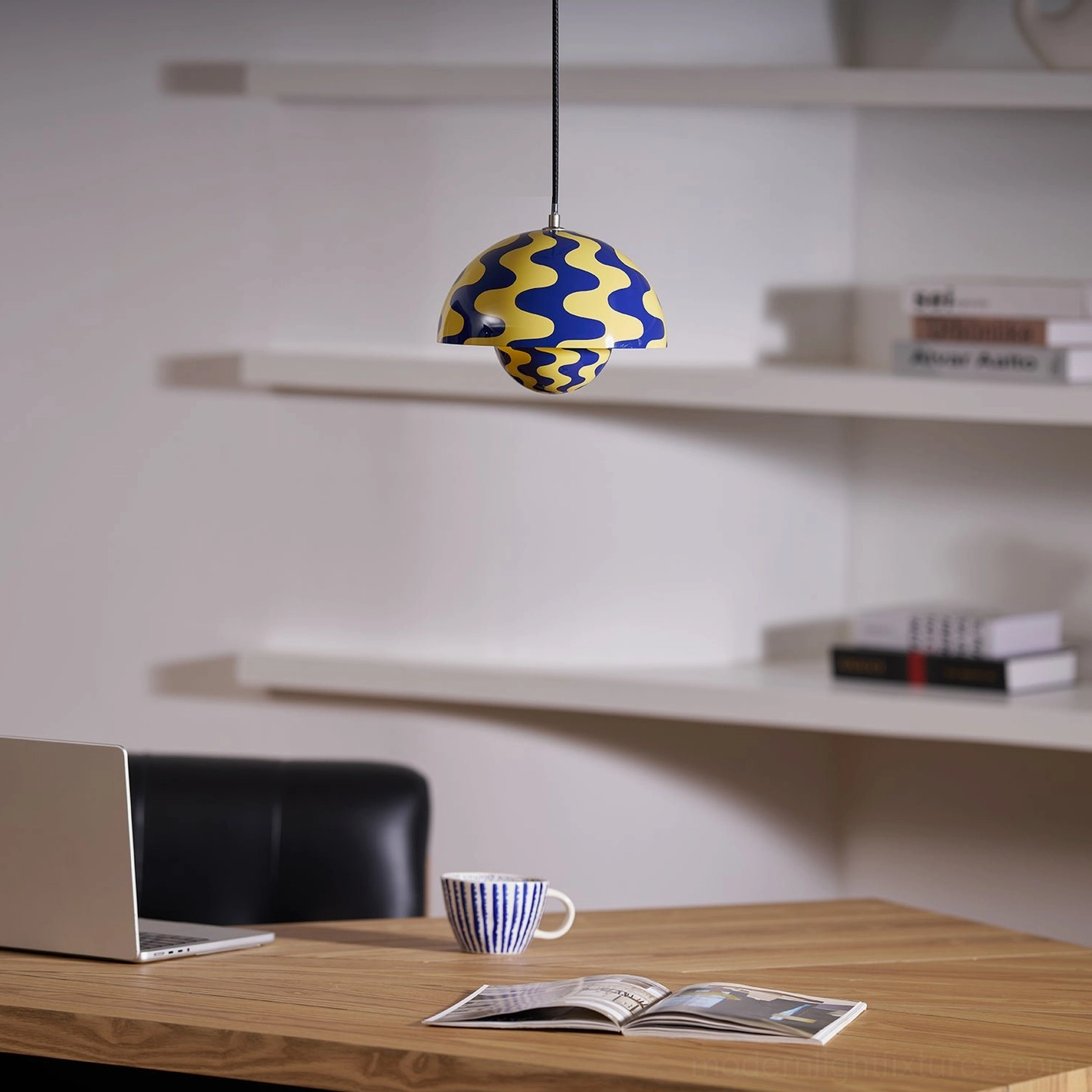 Flowerpot pendant light geometric profile emphasizing sculptural hemisphere form