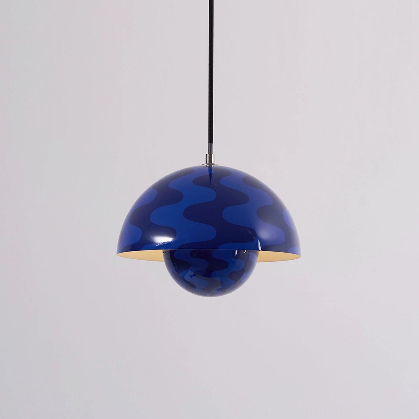 Flowerpot pendant light casting geometric shadow pattern on ceiling surface