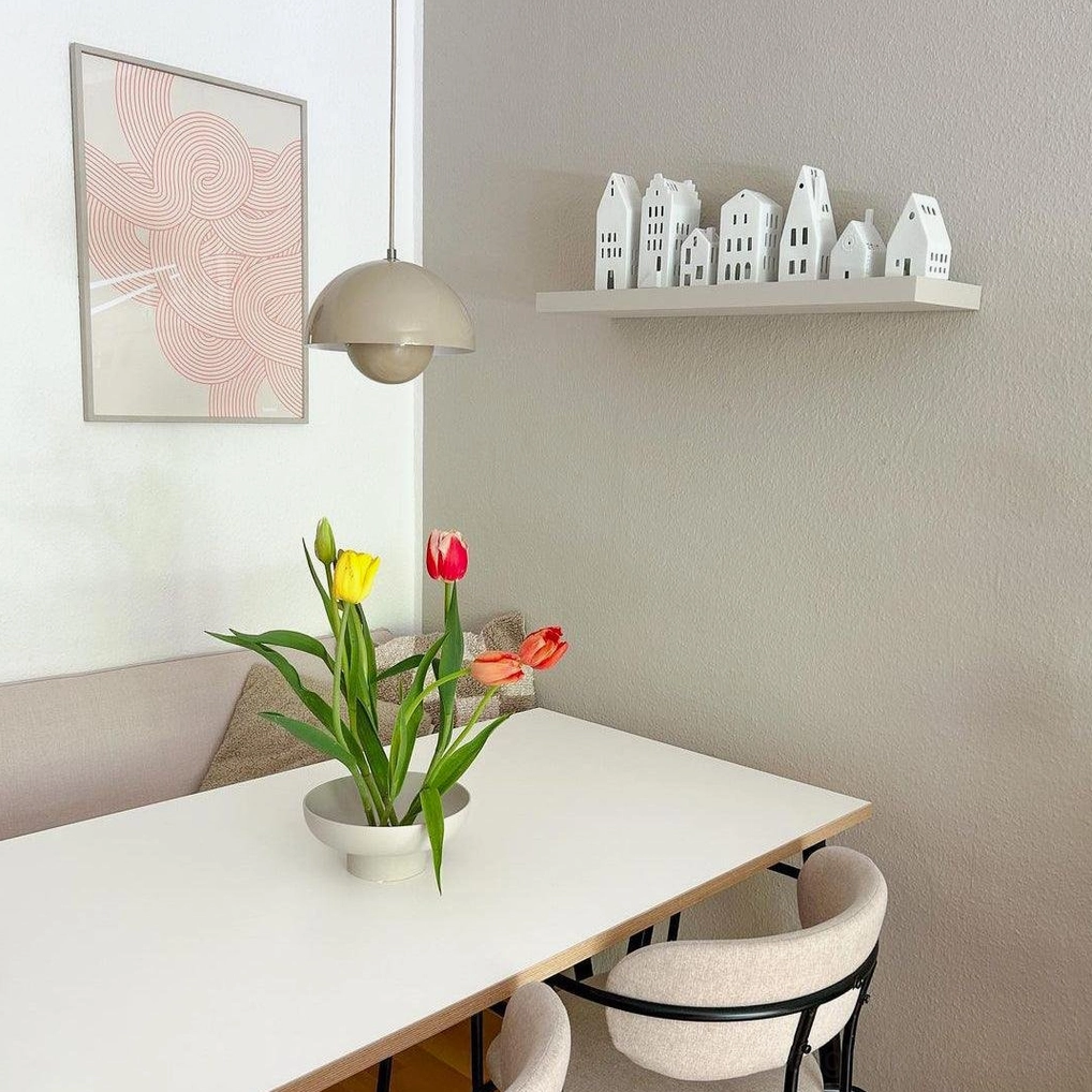 Flowerpot pendant light in haze blue finish creating soft cool tone in space