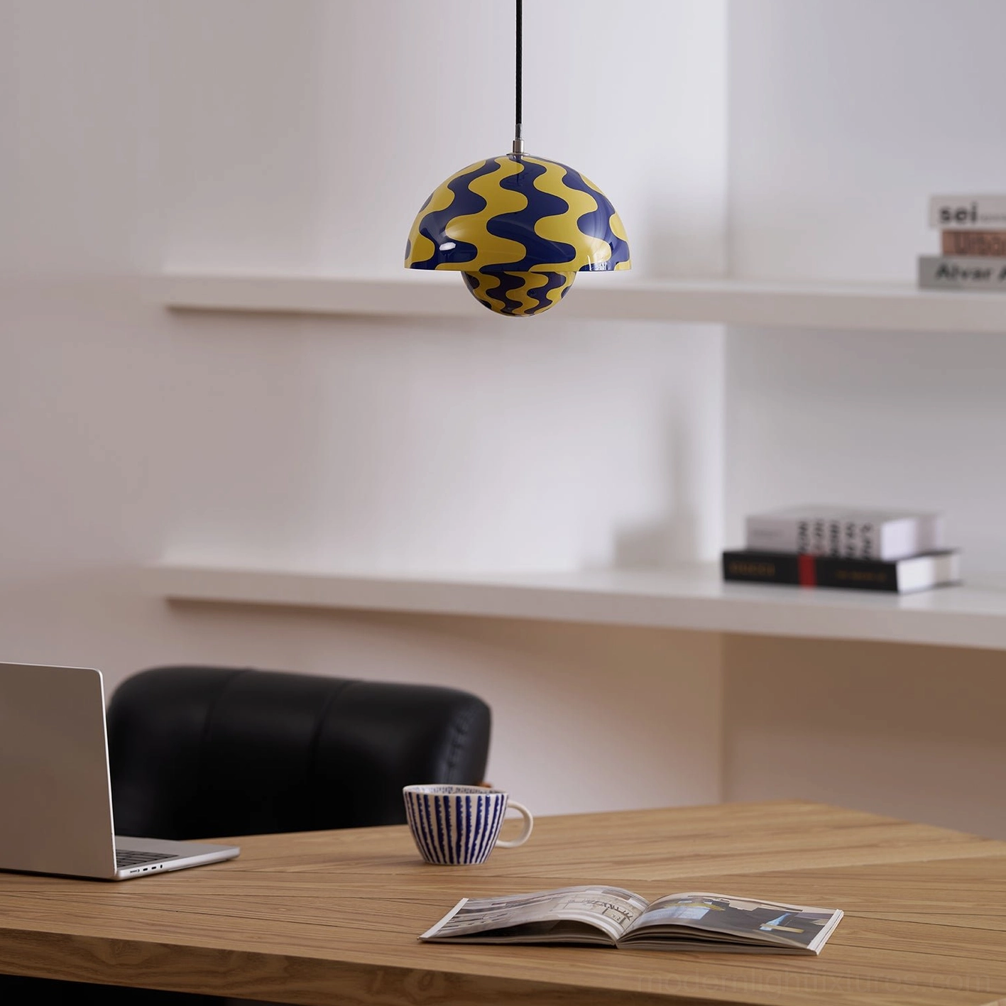 Flowerpot pendant light paired with modern dining chairs and clean table design