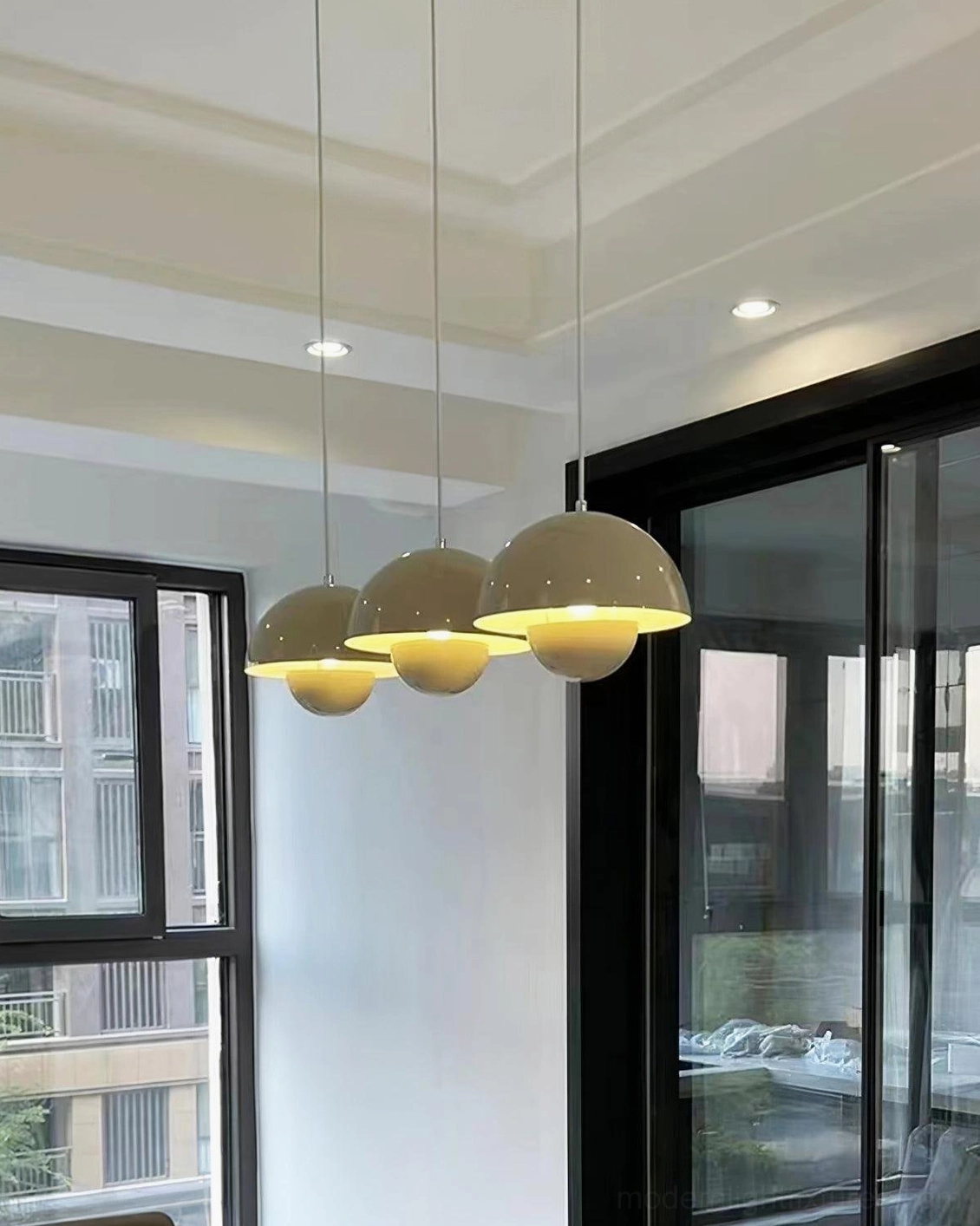 Flowerpot pendant light showing downward light direction and shadow pattern