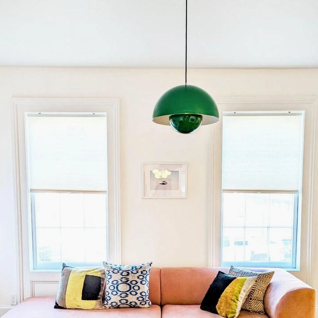 Flowerpot pendant light viewed from side angle showing clean sculptural profile