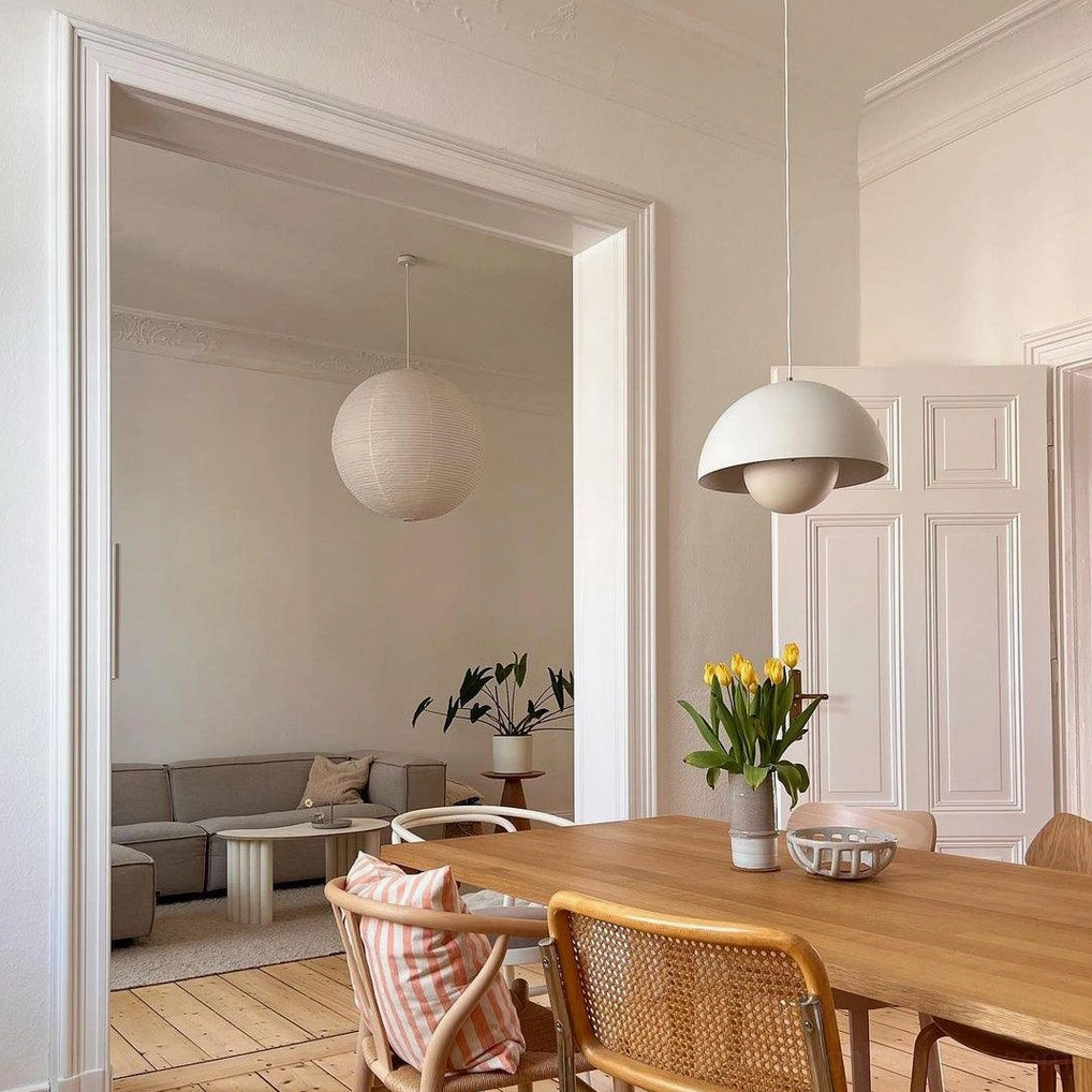 Multiple Flowerpot pendant lights in varied finishes demonstrating color versatility and mixing options