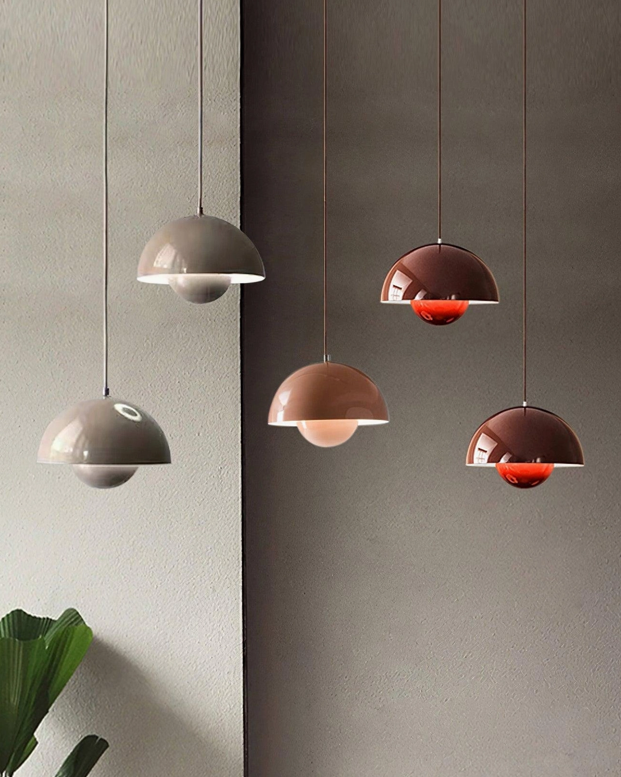 Flowerpot pendant light paired arrangement above industrial concrete island counter
