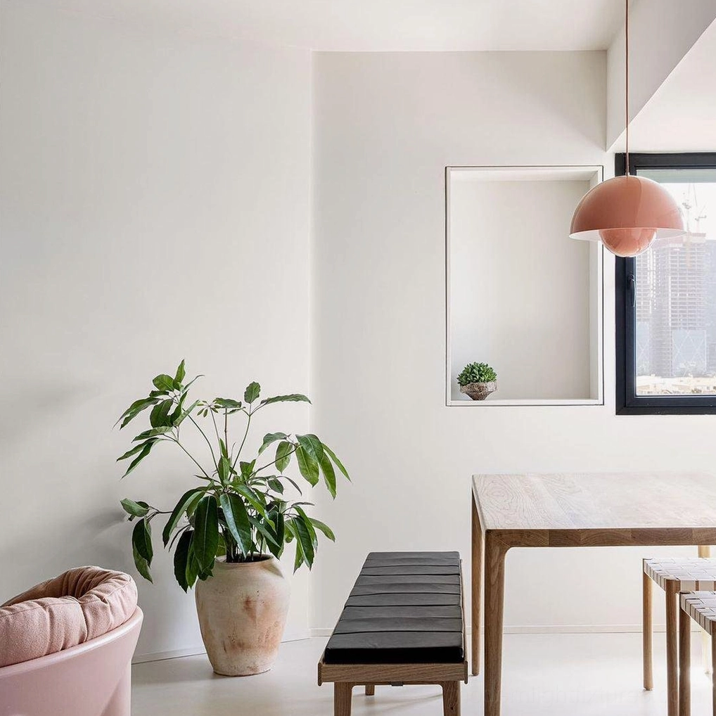 Pair of Flowerpot pendant lights in matching finishes creating balanced kitchen island lighting