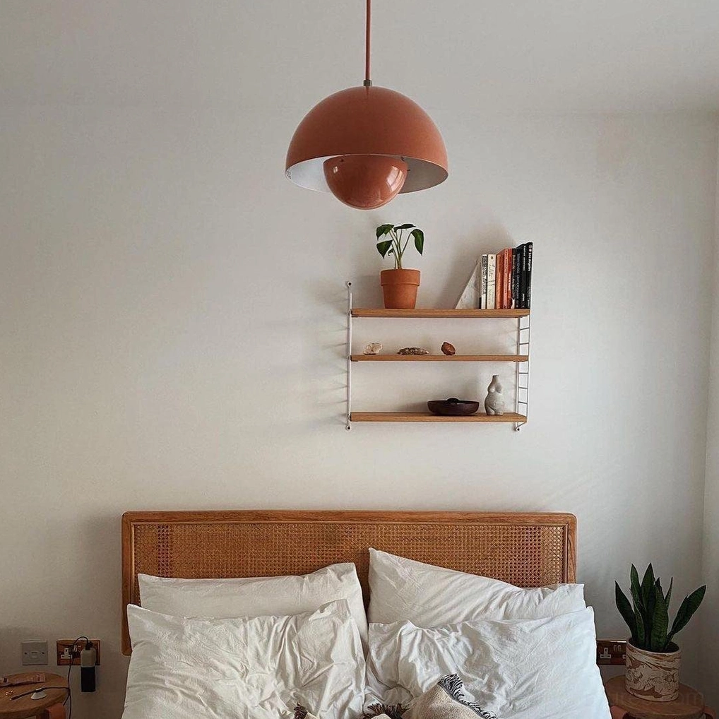Terracotta Flowerpot pendant light in bedroom with boho minimalist rattan bed design