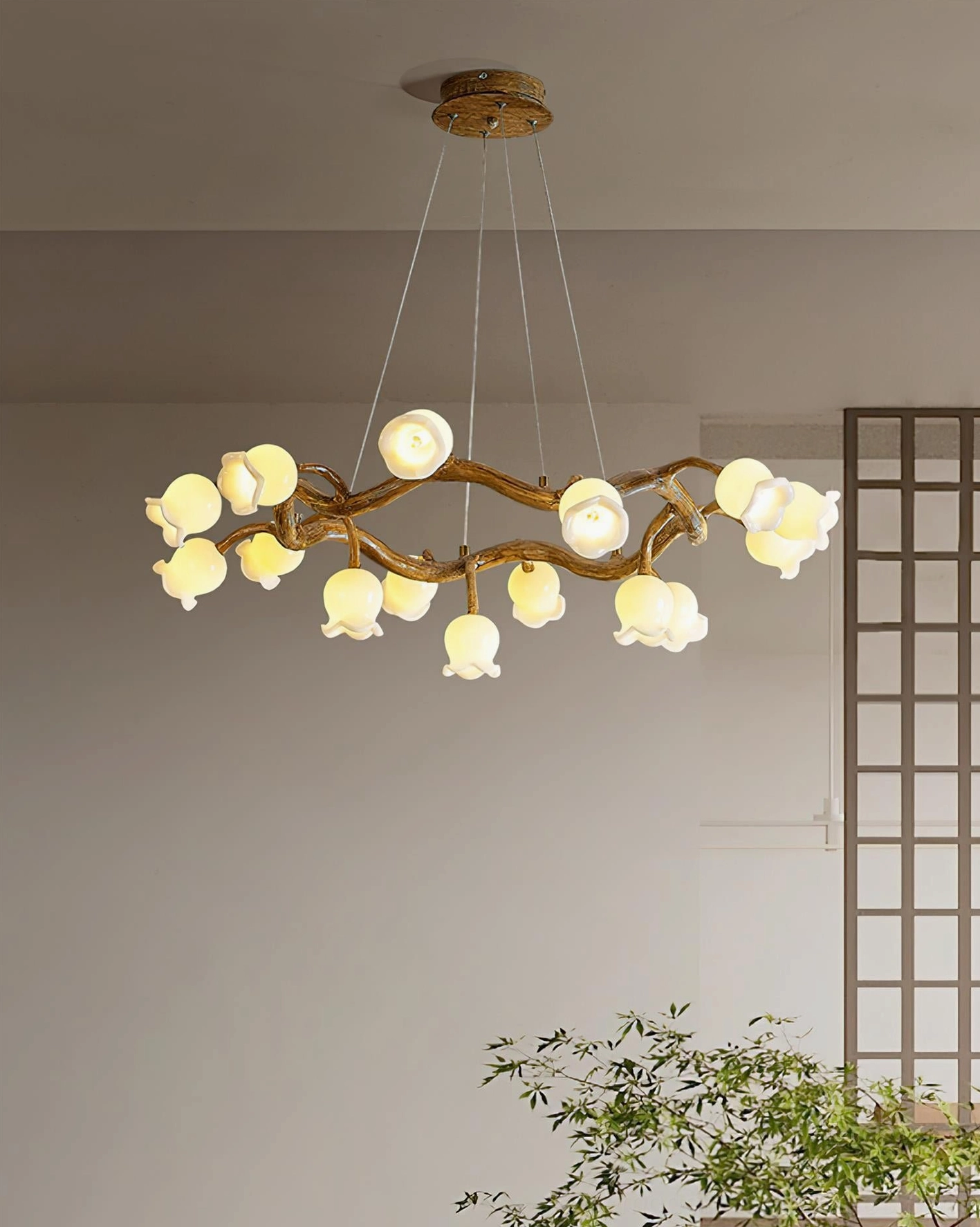 Flowers branch chandelier in minimalist Japanese-style residential space with green plants