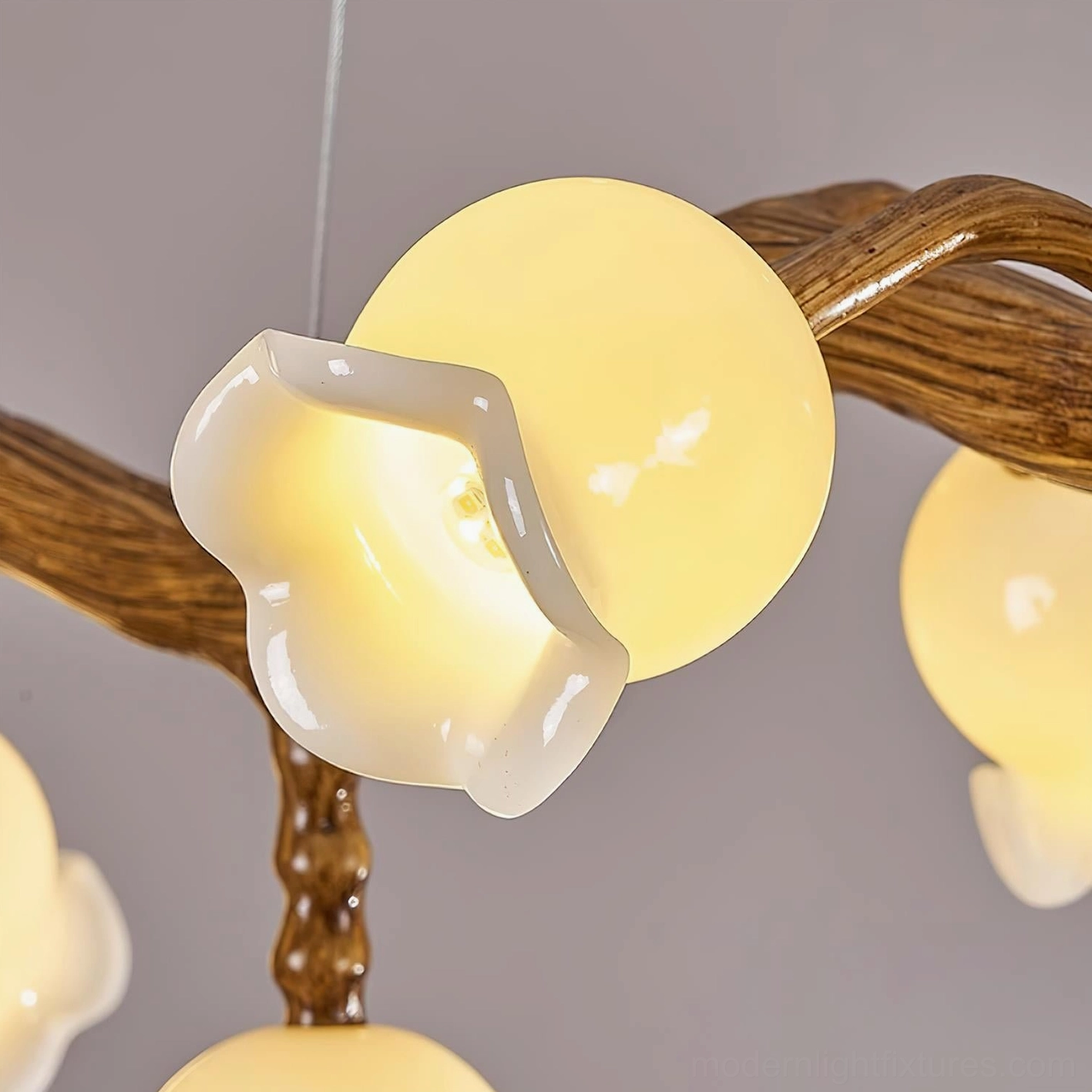 Flowers branch chandelier overhead view showing lily of the valley botanical design inspiration
