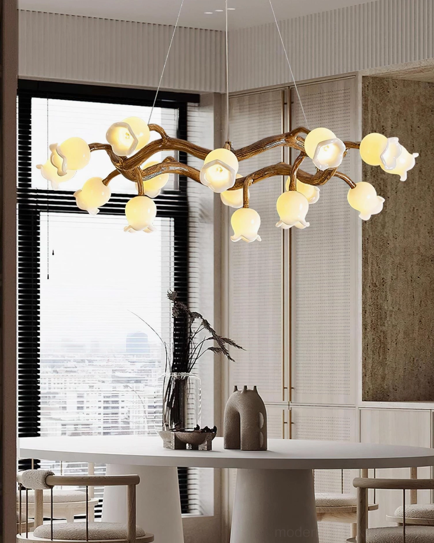 Flowers branch pendant light in modern dining room with floor-to-ceiling windows and warm ambiance