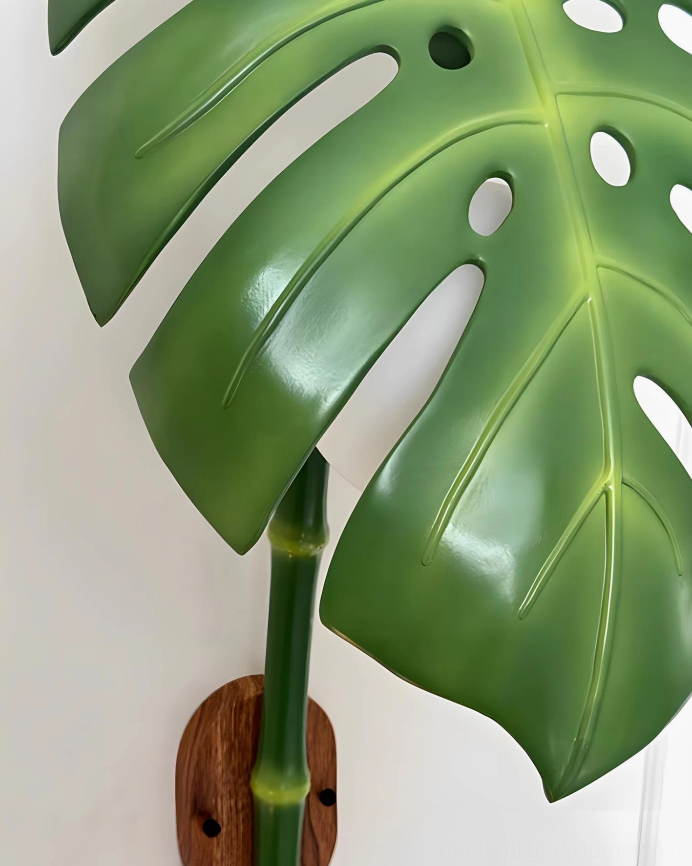 Folium monstera wall sconce with E14 socket and dimmer compatibility for ambient lighting control