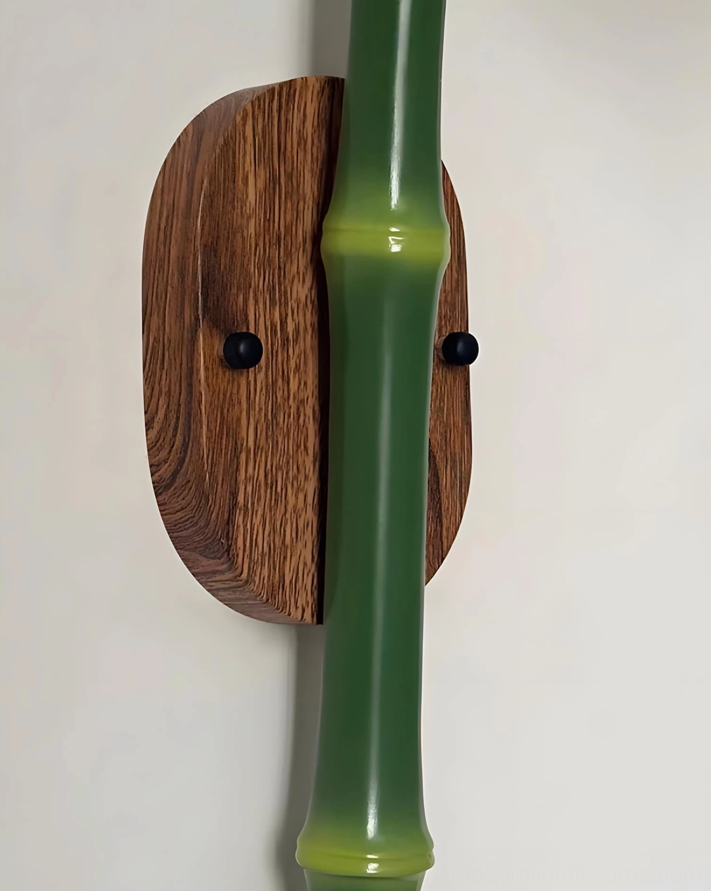 Folium wall sconce installation showing proper mounting and electrical configuration
