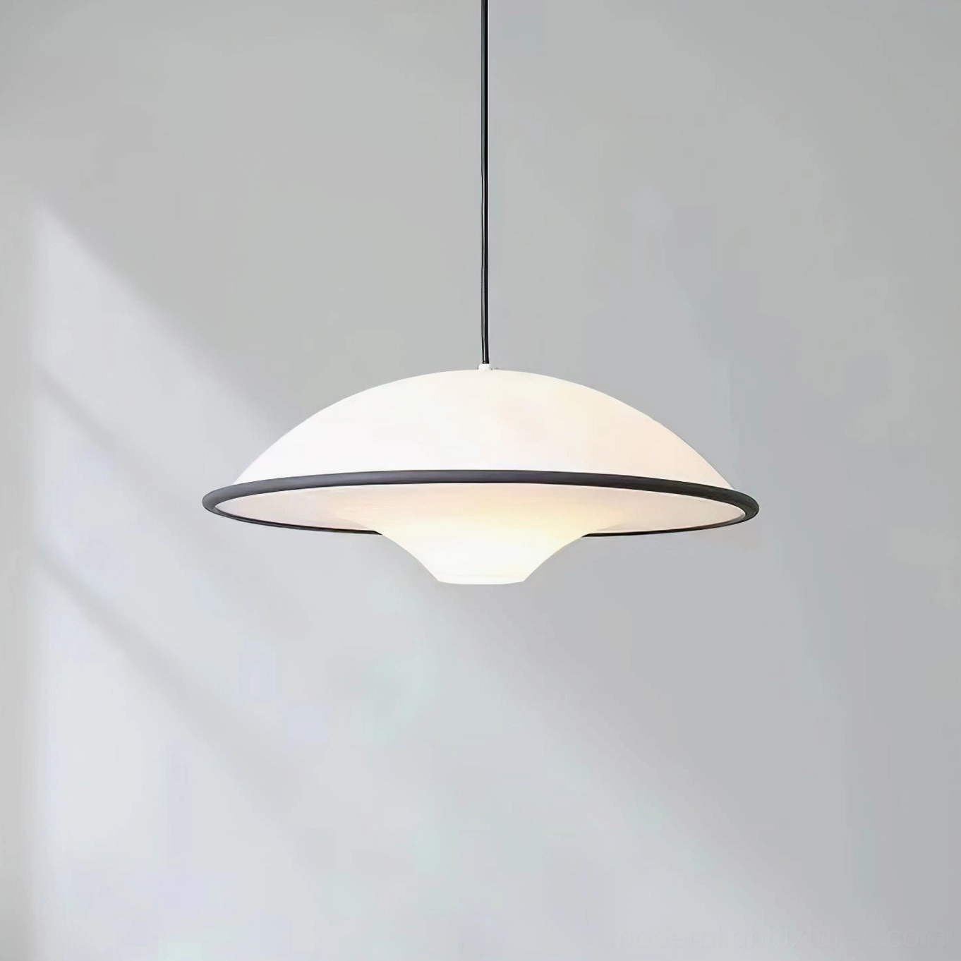 Fontana modern UFO pendant shade with natural light shadows, minimalist contemporary style