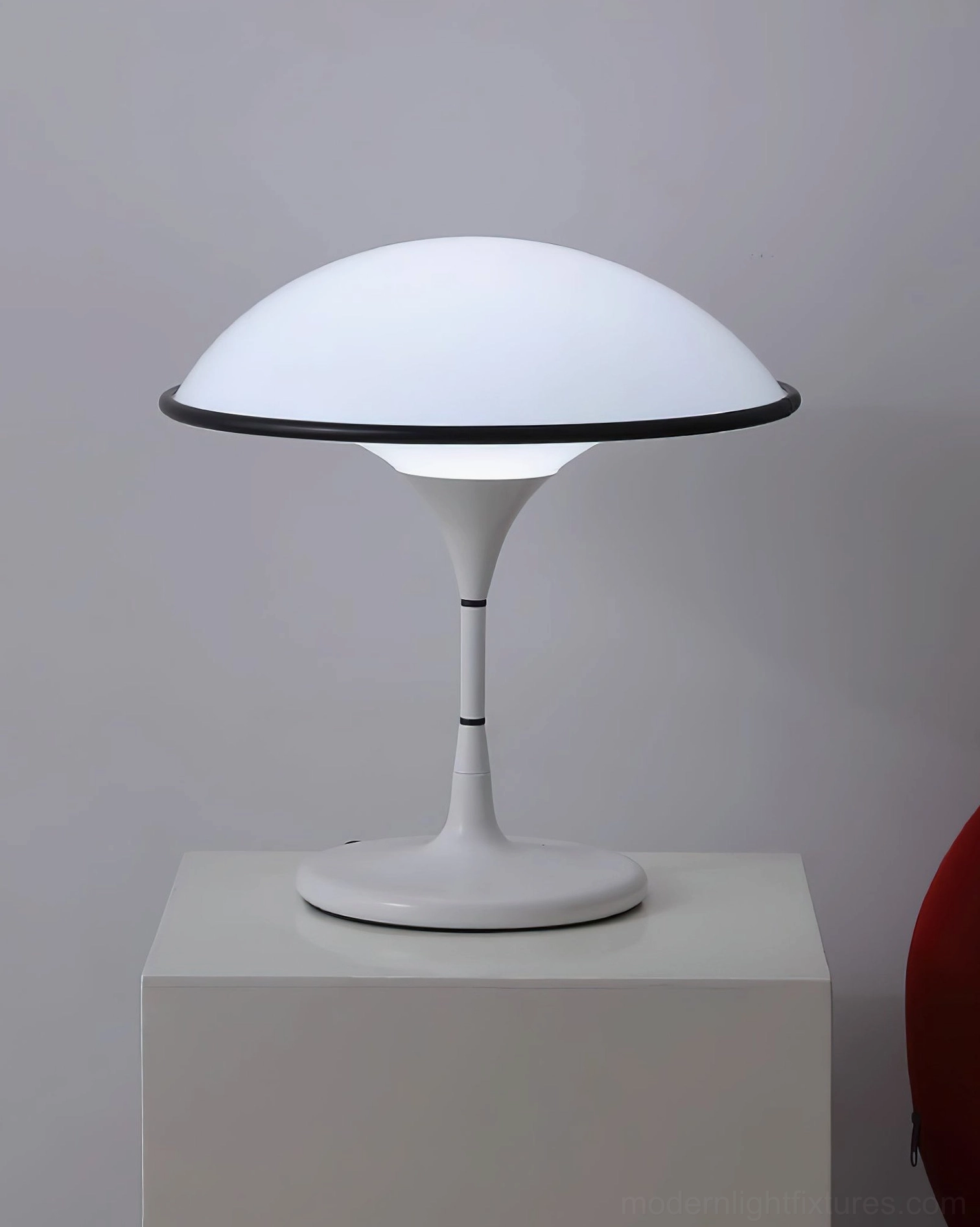 Fontana table lamp white body black trim on white plinth product showcase