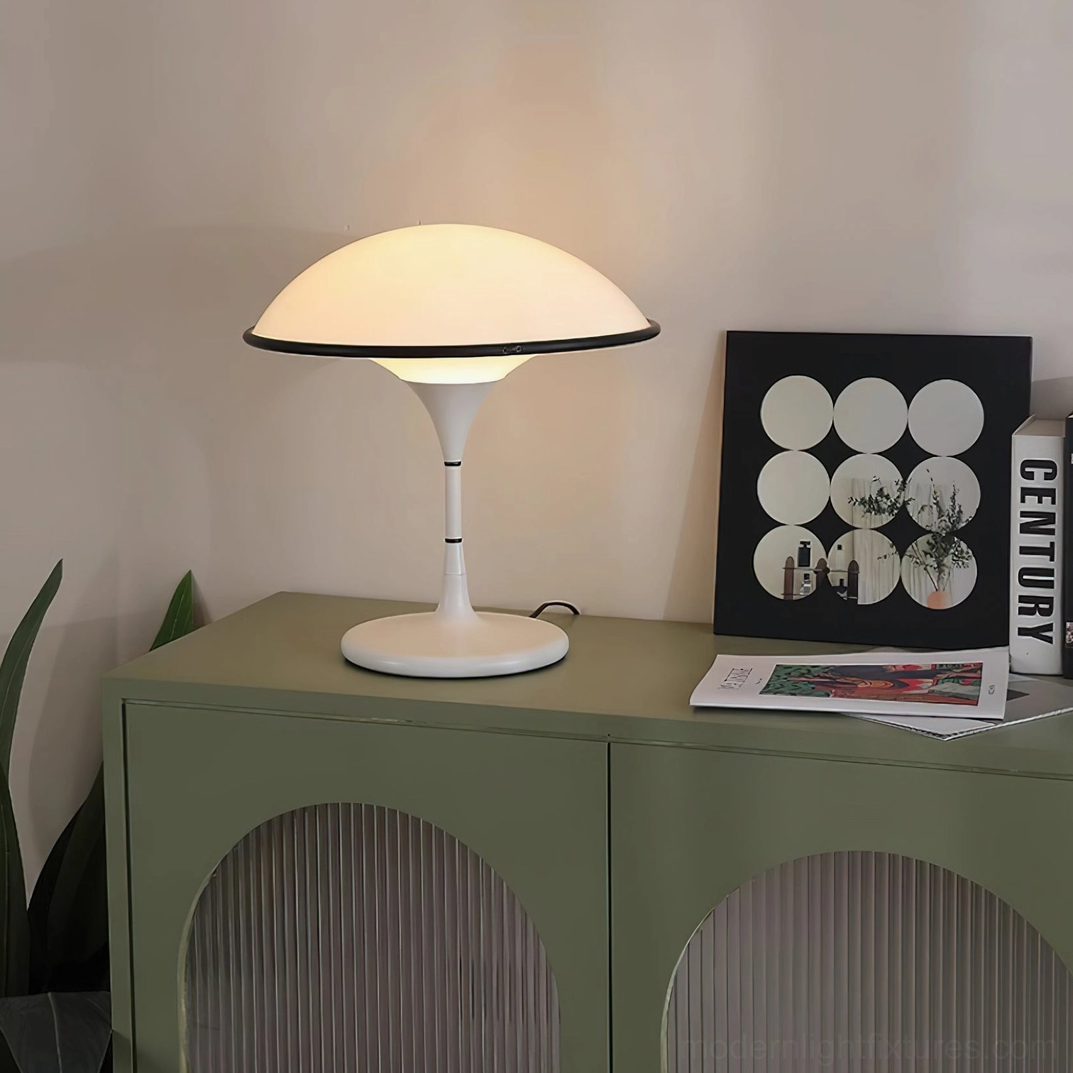 Fontana mushroom table lamp on green cabinet close-up warm glowing light ambiance