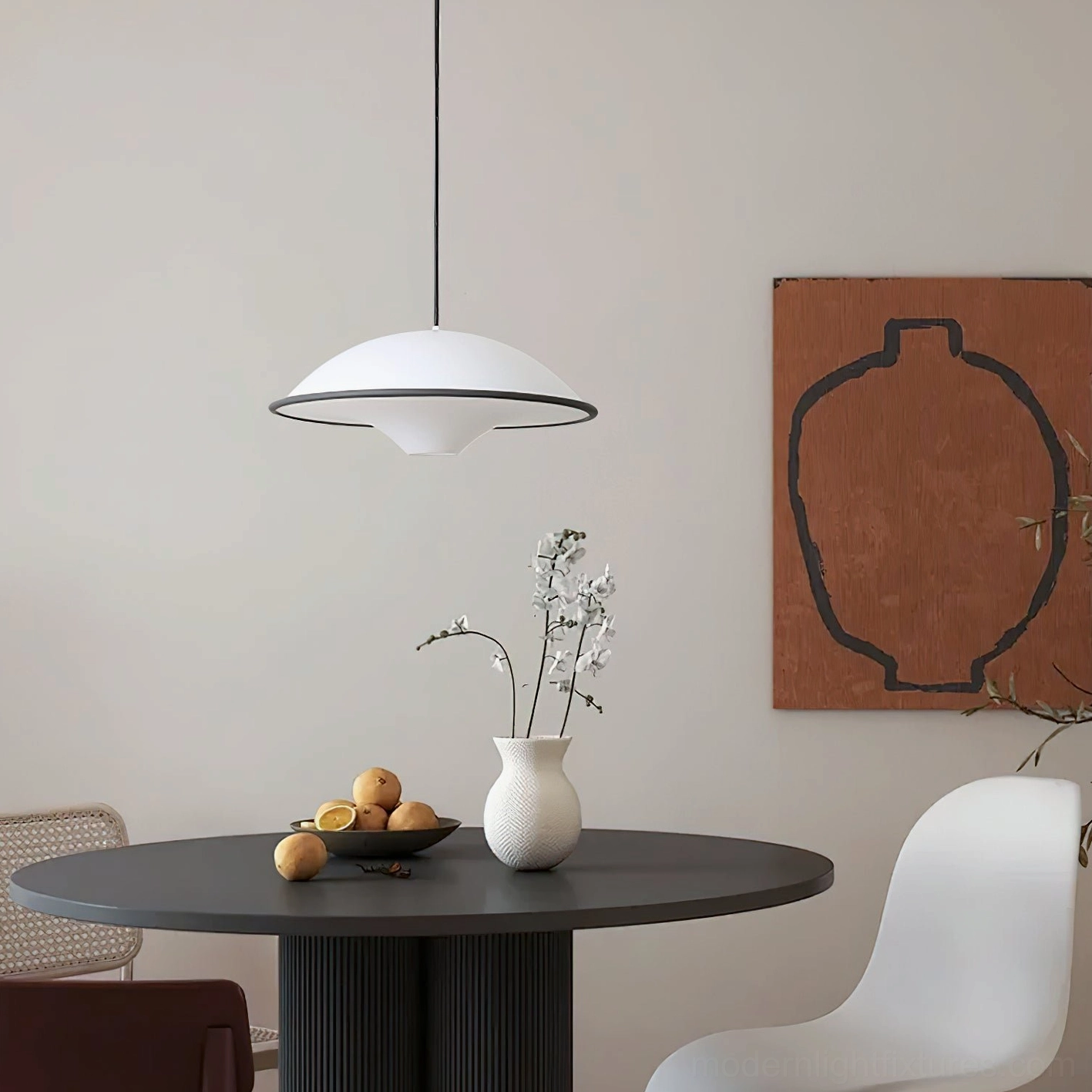 Fontana pendant light overhead dining room view, warm diffused illumination with neutral decor