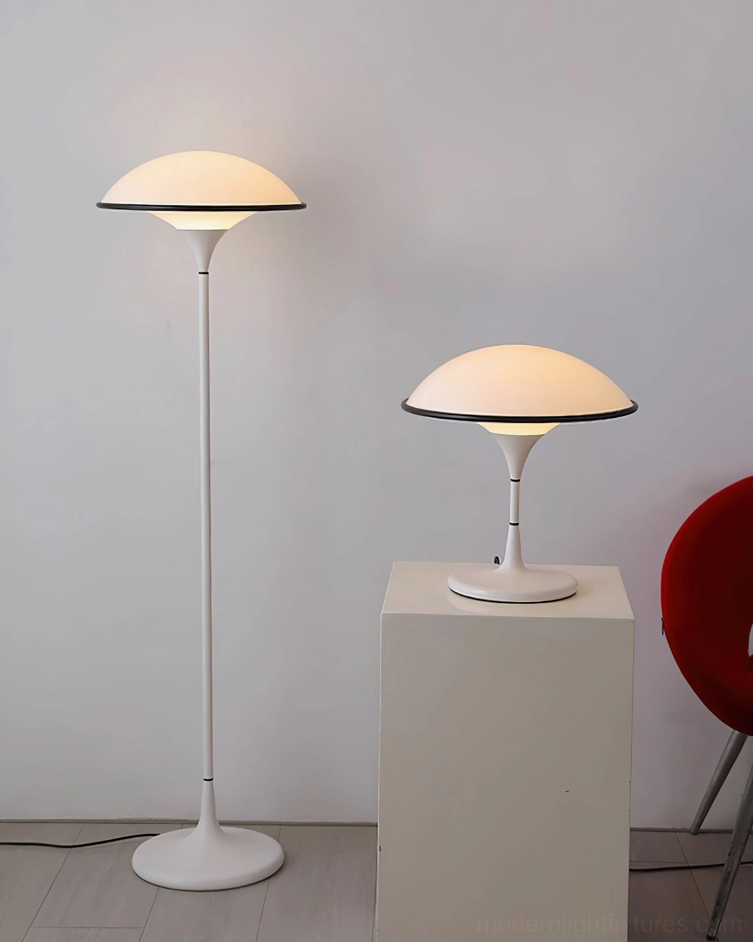 Two matching Fontana mushroom table lamps paired with floor lamp in modern corner setting