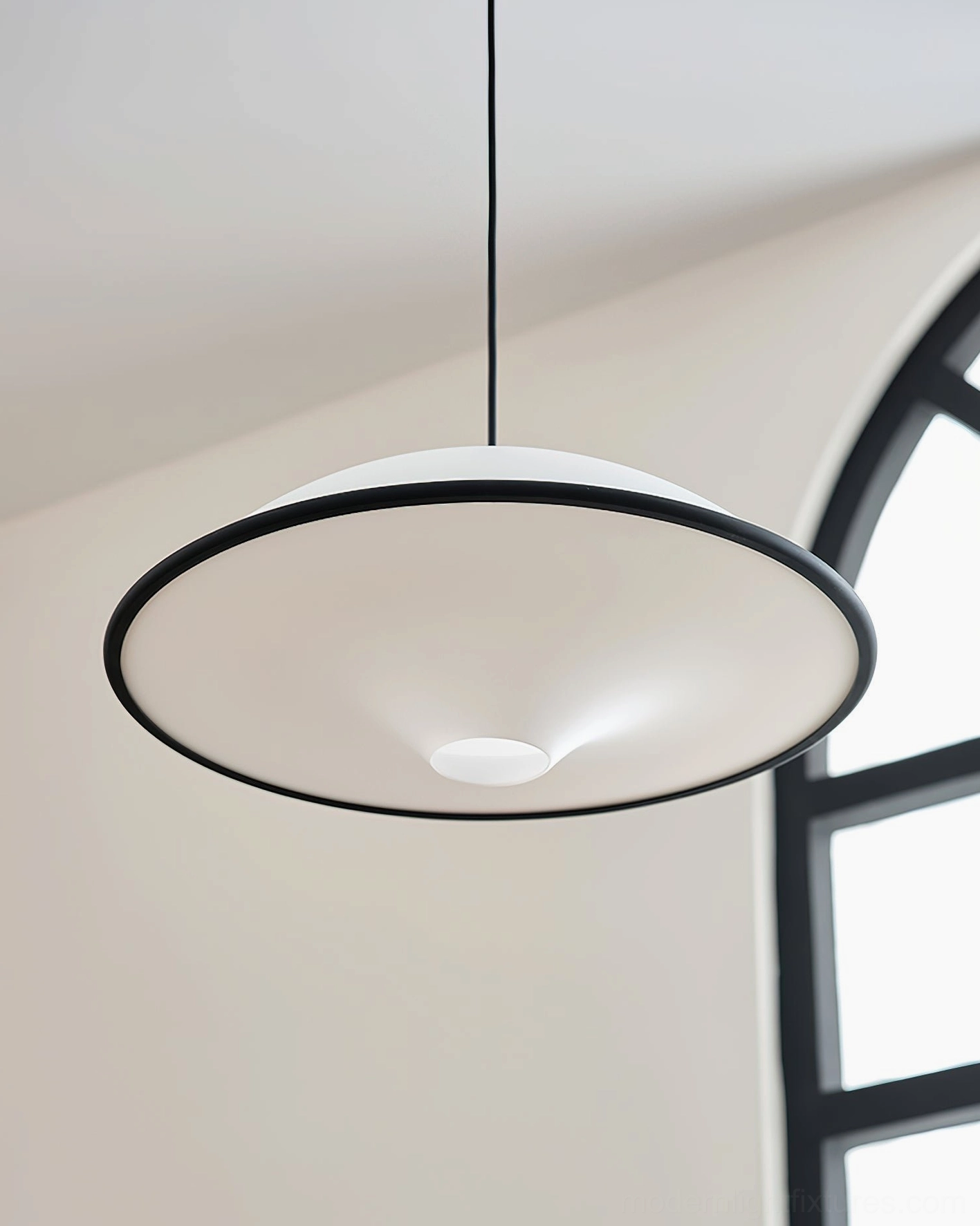 Fontana UFO pendant fixture bottom view with black outer rim, modern ceiling light installation