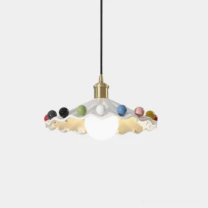 Fonthill handmade ceramic scalloped pendant light with glossy white and colorful glazed shade and solid brass fixture close-up front view