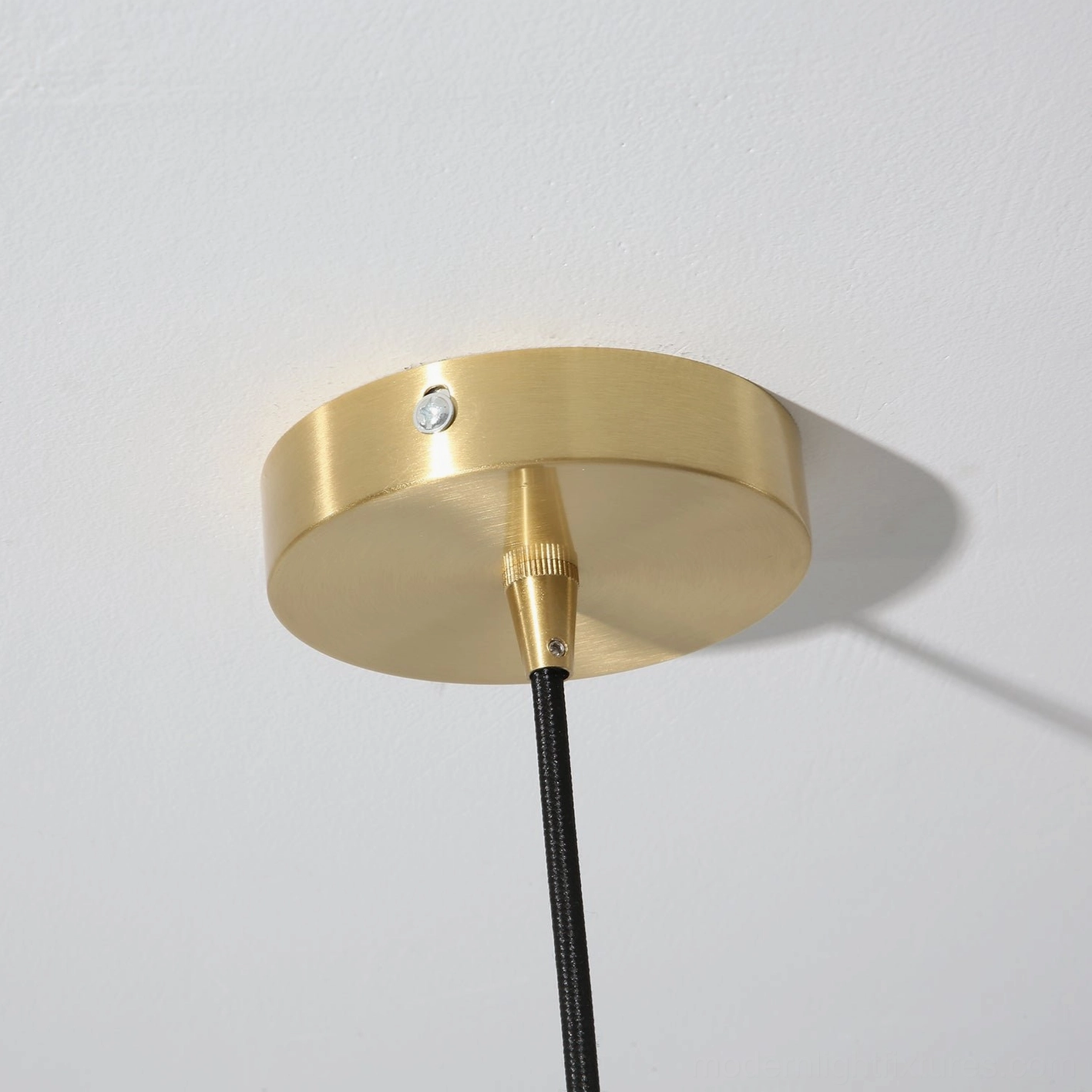 Fonthill ceramic pendant light front view glossy surface finish light reflection detail