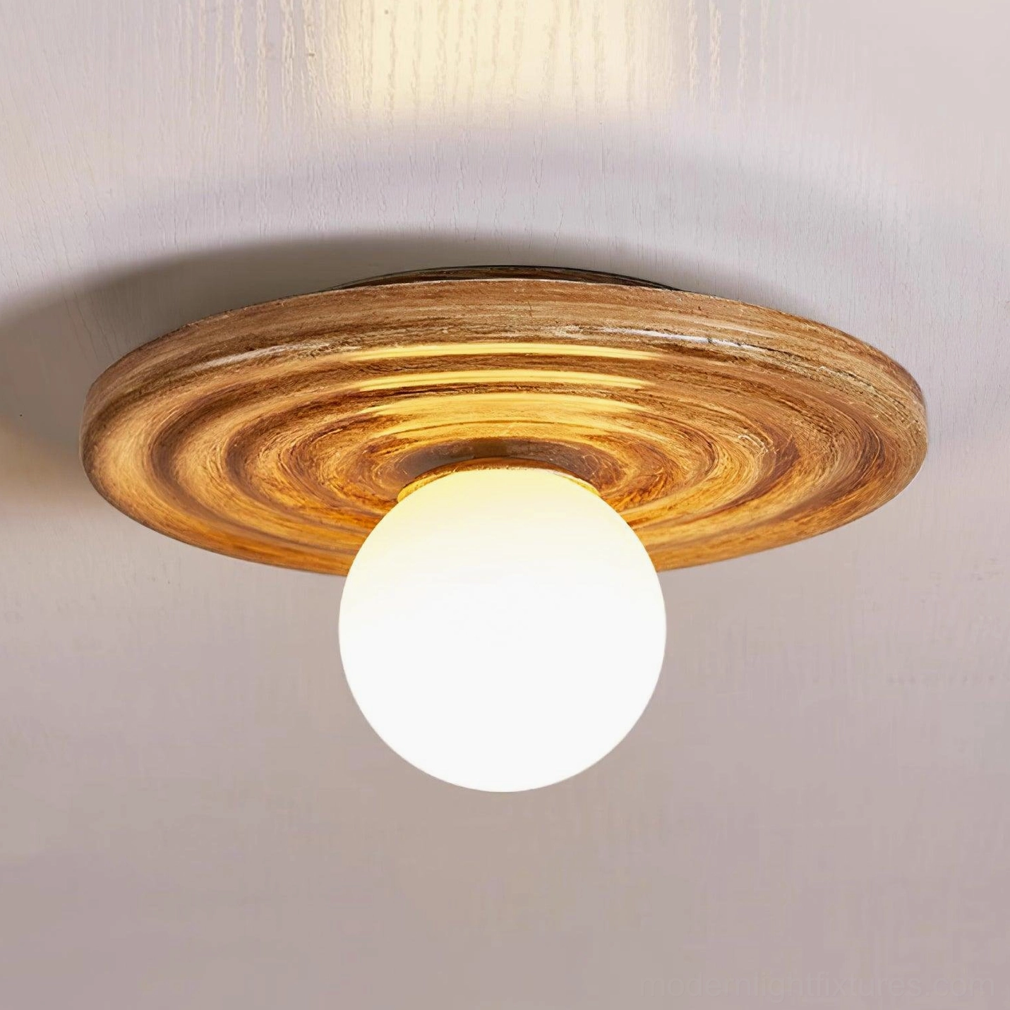 Francie wabi-sabi disc light overhead view showing complete circular form with concentric ribbed texture pattern