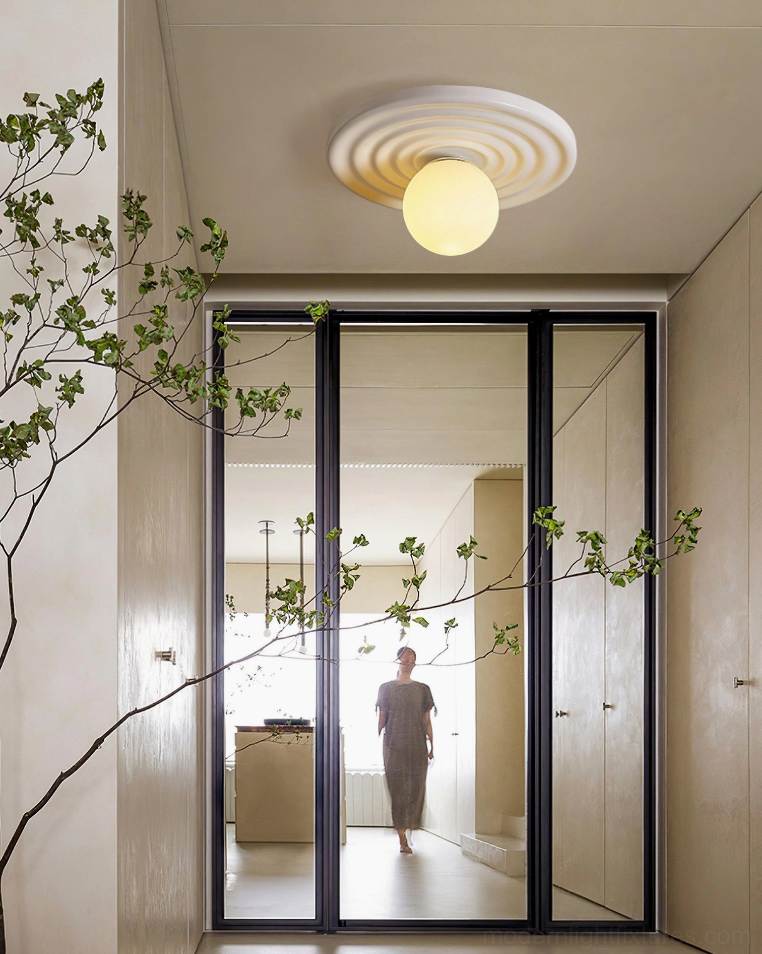 Francie ribbed disc light fixture displaying warm ambient illumination and soft diffused glow from integrated bulb