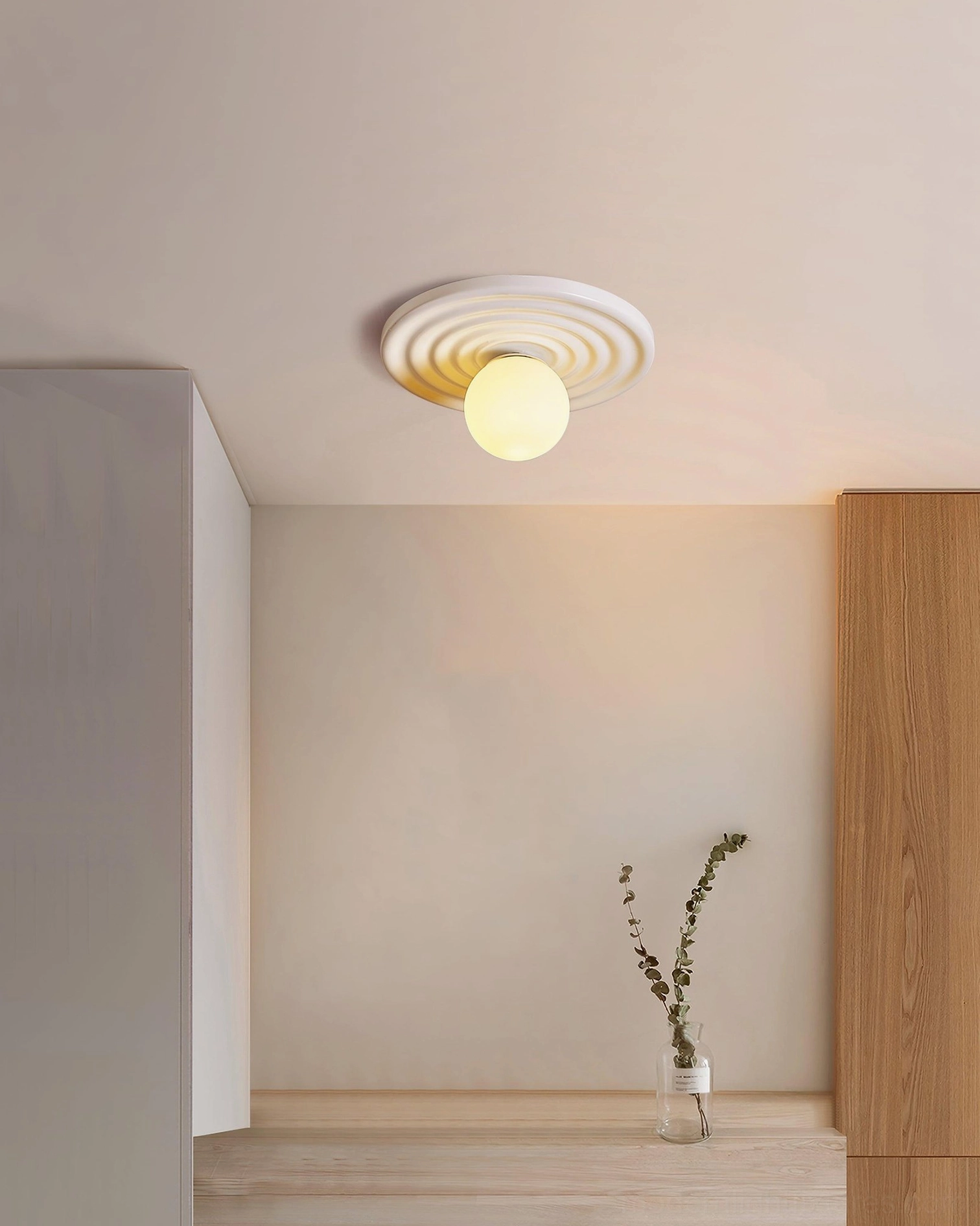 Francie ribbed ceiling light fixture mounted in minimalist living room corner with warm wood accents and neutral walls