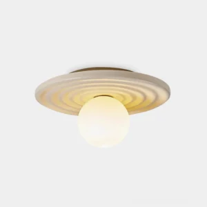 Francie modern ribbed disc ceiling light with opal frosted glass, front studio view showcasing concentric texture pattern and warm glow