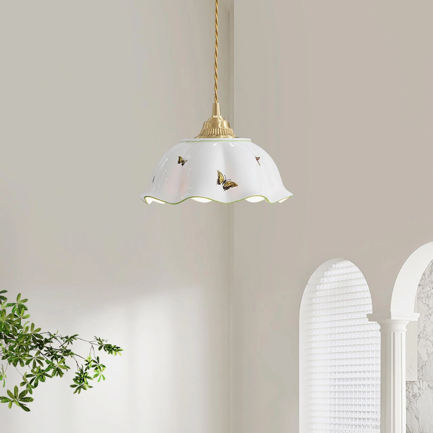 Handcrafted ceramic butterfly pendant lamp in French retro style interior with arched window