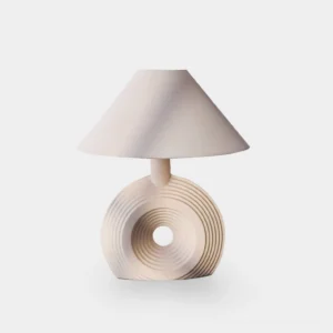 Freya ceramic table lamp front view with rippled off-white base and hand-stitched parchment shade on white background
