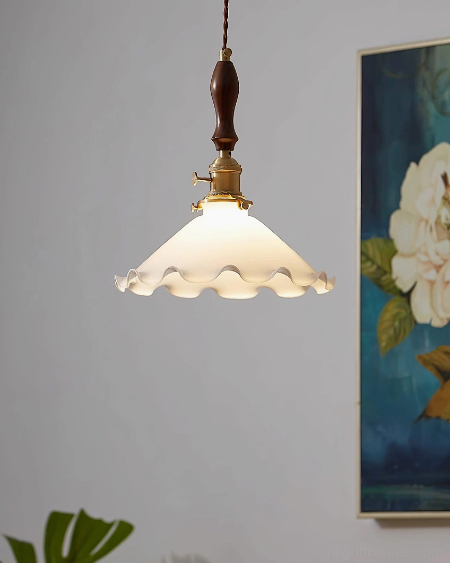 Frosted flower pendant lamp with delicate ruffled edges, close-up detail view